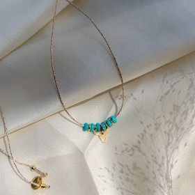 collier turquoise et tête de bufle