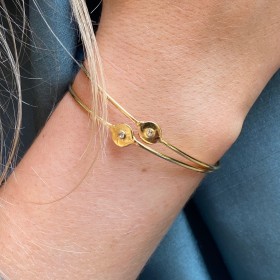 Gold plated cuff with white...